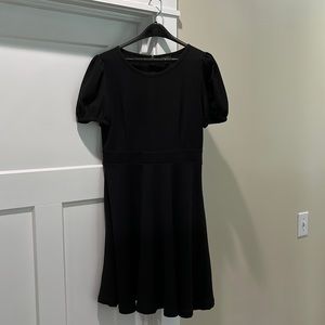 Ann Taylor black dress with puffy sleeves and midline waist Light gauzy material